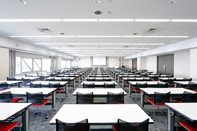 Convention Room 1 at ATC Hall — theater-style setup with panoramic Osaka Bay view