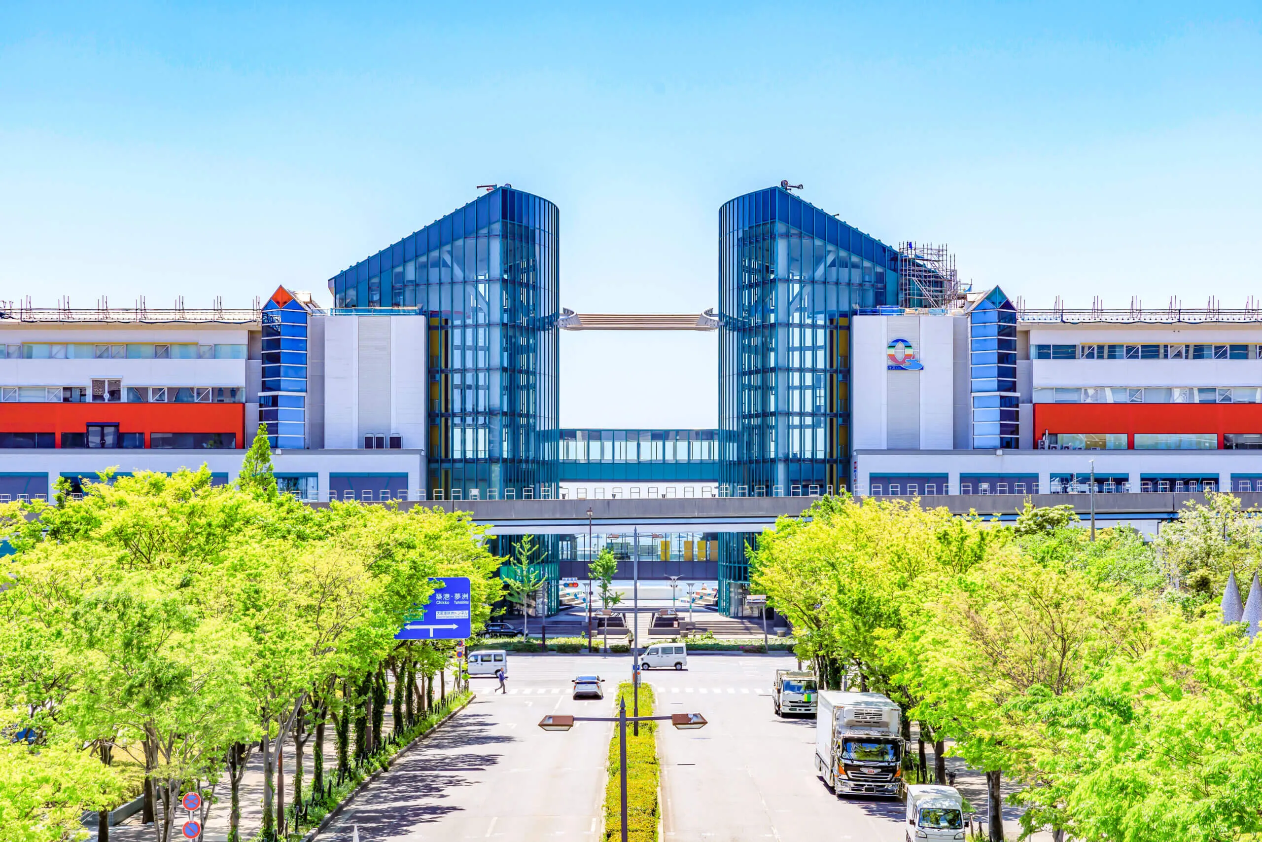 Osaka Bay waterfront venue at sunset with modern conference facilities